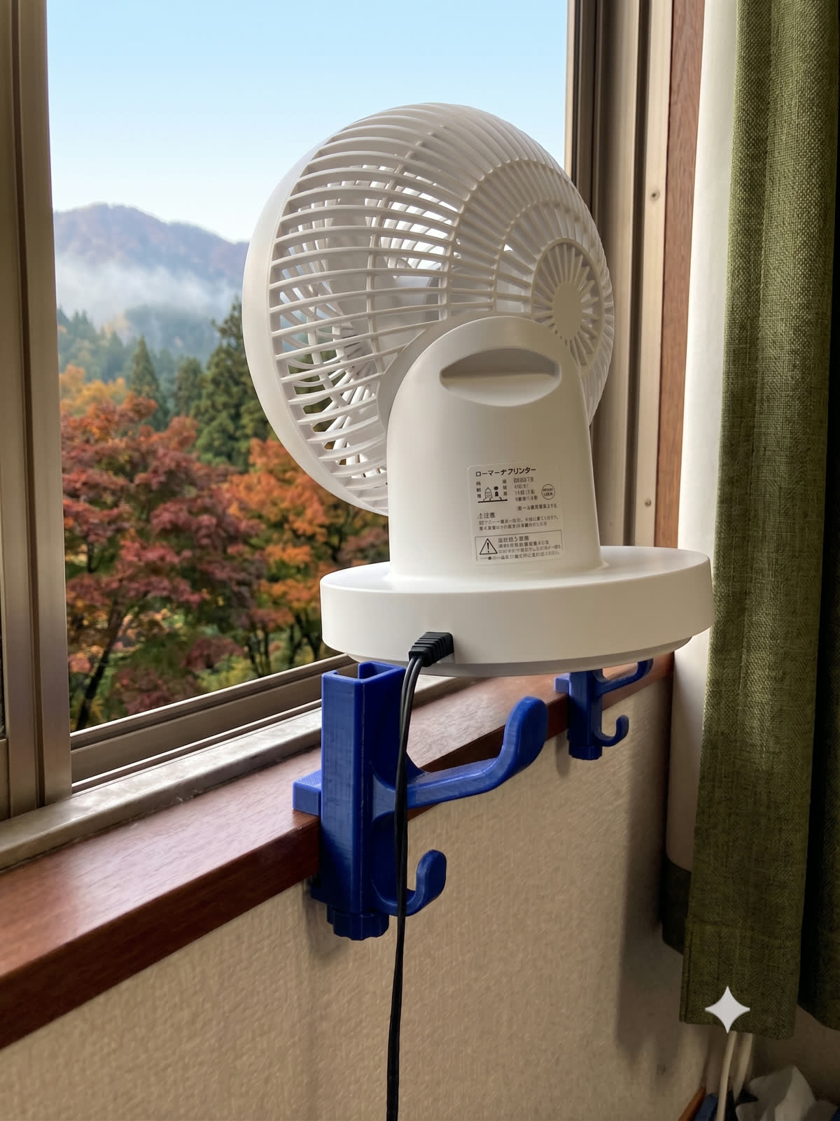 窓際にサーキュレーターを置いて換気に使う例